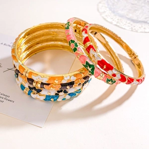 Golden enamel flower bangles with vintage Chinese begonia patterns in vibrant colors