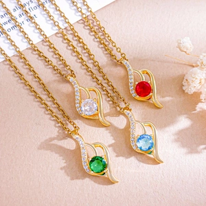 Elegant gold teardrop necklaces with vibrant zircon stones in four colorful styles