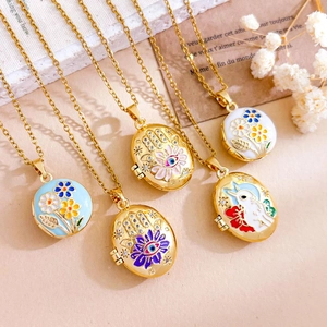 Golden titanium steel locket necklaces with enamel evil eye and floral designs