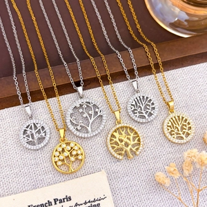 Elegant Tree of Life necklaces set in gold and silver finish with sparkling zircon accents