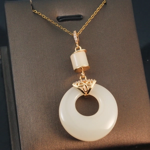 Elegant gold plated necklace with white faux jade safety buckle pendant and zircon accents
