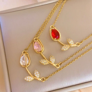 Elegant gold tulip necklaces featuring red, pink and white crystal flower pendants