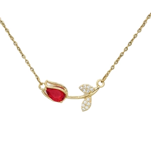 Elegant gold tulip pendant necklace with red teardrop stone and pavé crystal leaves