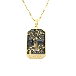 Vintage gold-framed tarot card necklace featuring temperance relief on white background