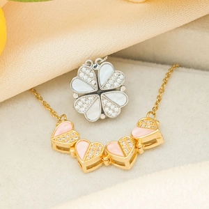 Convertible clover and heart necklace in gold finish with pink enamel and zircons