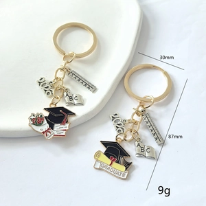 2026 graduation keychain with black mortarboard and diploma pendants for student gifts