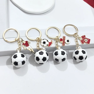 Détails de porte-clés foot 3D avec maillot de soccer et pendentifs joueur et anneaux dorés