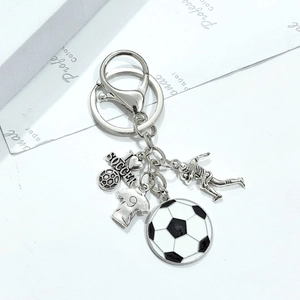 Detail of silver soccer keychain with I LOVE SOCCER charm and jersey pendant