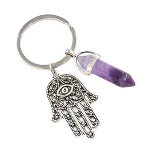 Vintage silver Hamsa Hand keychain with purple crystal pillar and evil eye detail