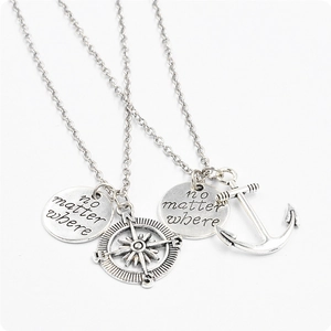 Silver anchor and compass pendant necklaces with No Matter Where engraved round tags