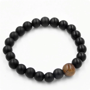 Matte black onyx beads bracelet with natural tiger eye stone for men on white background