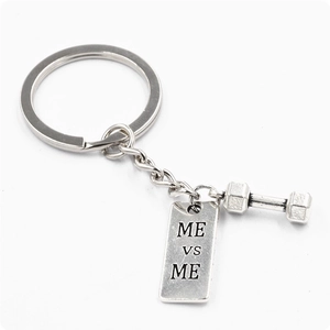 Silver barbell dumbbell keychain with engraved ME VS ME motivation tag for fitness lovers