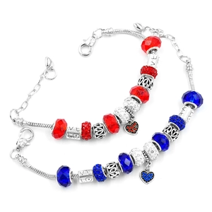 Detailed close-up of Pandora style snake chains with red and blue crystal heart beads