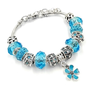 Blue crystal beaded charm bracelet with silver snake chain and clover flower pendant