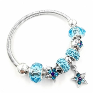 Silver beaded charm bracelet with blue crystal beads and a sparkling star pendant