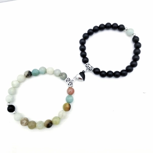 Bracciali magnetici per coppie con perline nere opache e pietre naturali turchesi
