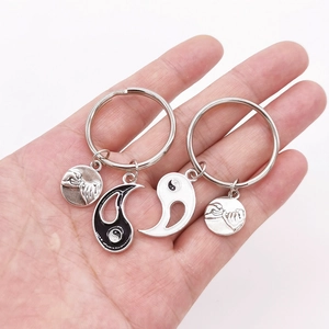 Yin Yang matching keychains with Pinky Swear charms for couples and best friends