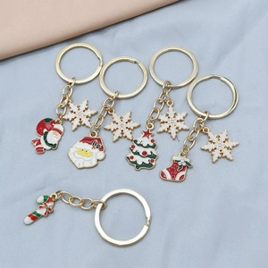 Detail of 5-piece Christmas alloy keychains with Santa Claus, tree and snowflake charms