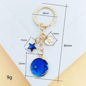 Porte-clés zodiaque ciel étoilé bleu avec breloque lune dorée et lion, longueur de 85mm