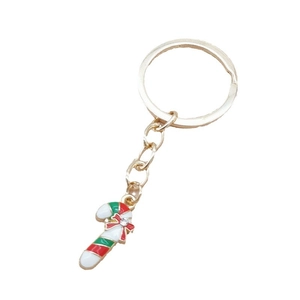 Christmas candy cane keychain with red bow and rhinestones on gold ring pendant