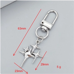 Porte-clés en alliage argenté avec pendentif étoile multicouche et fermoir mousqueton