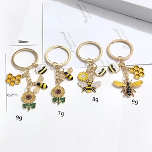 Ensemble de porte-clés émaillés abeille et tournesol en métal doré pour sacs
