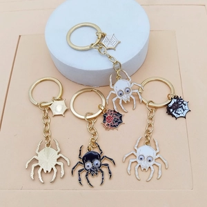 Ensemble porte-clés araignée Halloween gothique avec crânes et anneaux dorés