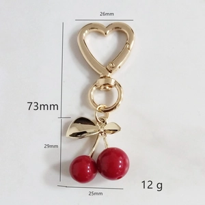 Detailed dimensions of cherry pendant keychain featuring golden heart lobster clasp