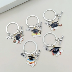 5-piece set of graduation 2026 keychains with mortarboard and scroll charms