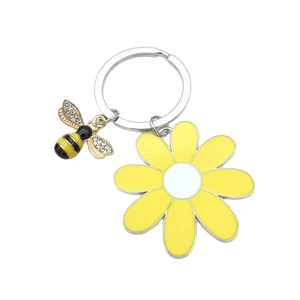Creative sunflower and bee keychain with sparkling crystal wings on a polished metal ring
