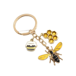 Porte-clés abeille créatif avec breloques de nid d'abeille doré et pot de miel