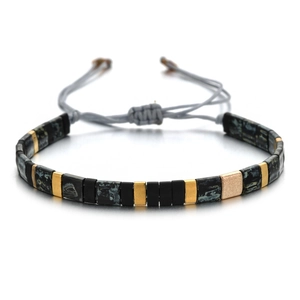 Detailed view of handmade MIYUKI Tila bead bracelet with gold and marble textures