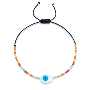 Bohemian Evil Eye beaded bracelet with colorful Miuki beads and adjustable black cord