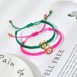 Bracelets tissés ajustable mauvais œil en vert et rose avec breloques dorées