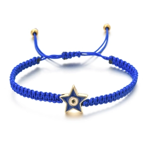 Detail of woven dark blue cord bracelet with gold pentagram evil eye charm and adjustable beads
