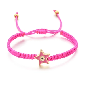 Detail of pink hand-woven bracelet featuring a pink enamel star with the evil eye symbol