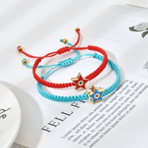 Handmade adjustable braided evil eye star charm bracelets in red and cyan for women