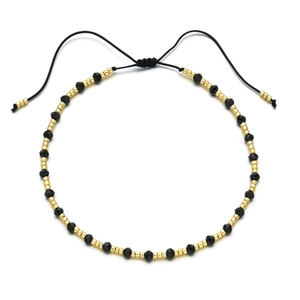 Adjustable black faceted natural stone bead bracelet with gold accents and drawstring cord
