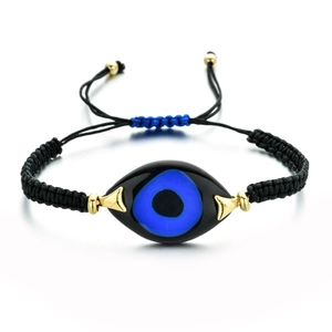 Adjustable Greek evil eye woven bracelet with black cord and golden bead accents