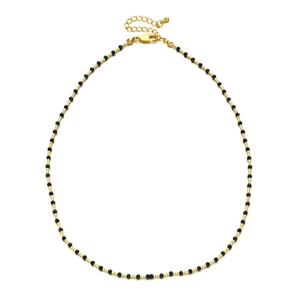 Detail of 2mm black faceted stone necklace with gold spacer beads and lobster clasp