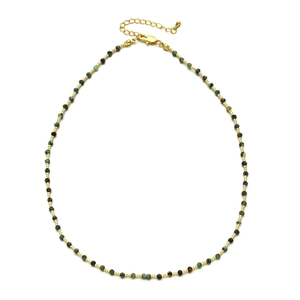 Detailed view of handmade beaded necklace with 2mm green stones and golden clasp