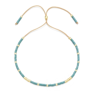 Bracelet en perles MIYUKI bohème bleu sarcelle et or avec cordon tressé ajustable