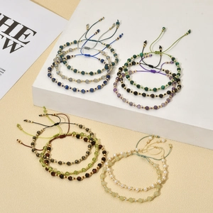 Bohemian faceted stone beaded bracelet with adjustable rope and golden spacers