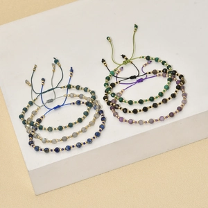 Close-up of 8-piece bohemian adjustable hand-woven beaded bracelets with stone beads
