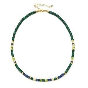 Detail of colorful natural stone beads and golden spacers with adjustable lobster clasp