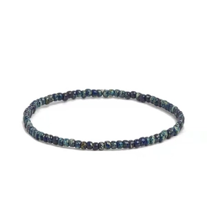 Pulsera retro hecha a mano con cuentas de semillas jaspeadas azul oscuro y verde