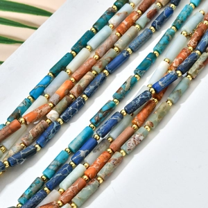 Handcrafted blue stone bamboo-style beaded necklace with gold spacers and marble texture