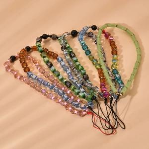Fashionable crystal beaded mobile phone charms in various colors with elegant light shadows