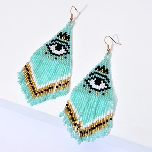 Boucles d'oreilles bohèmes Evil Eye à franges en turquoise et perles Miyuki fait main