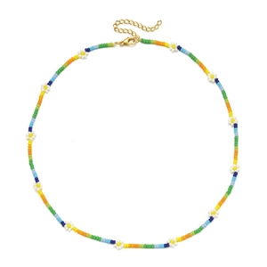 Detail of bohemian rainbow bead necklace with daisy charms and gold lobster clasp